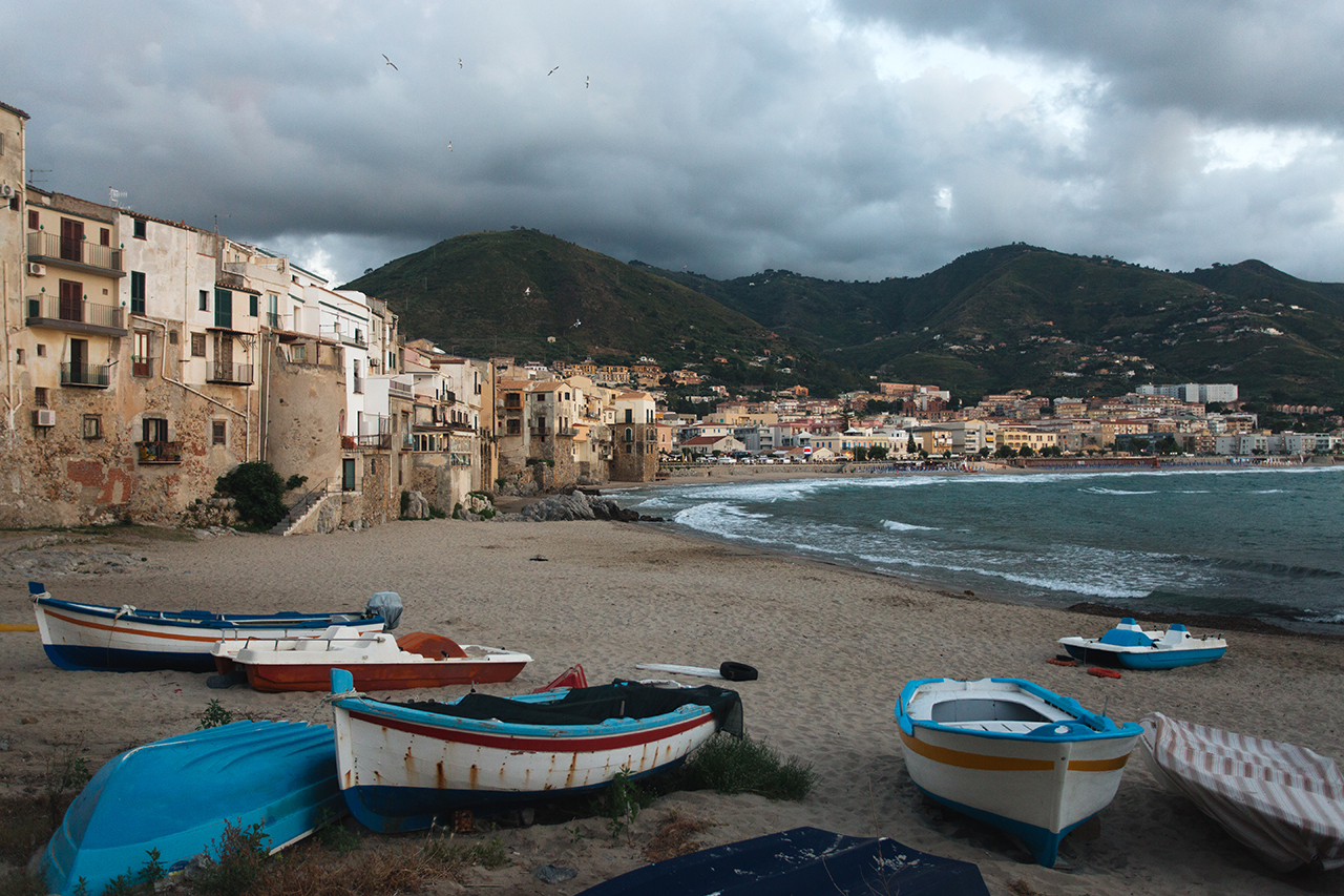 cefalù boats on the beach